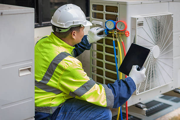 Professional Heat Pump Repair technician working in Cambridge, OH